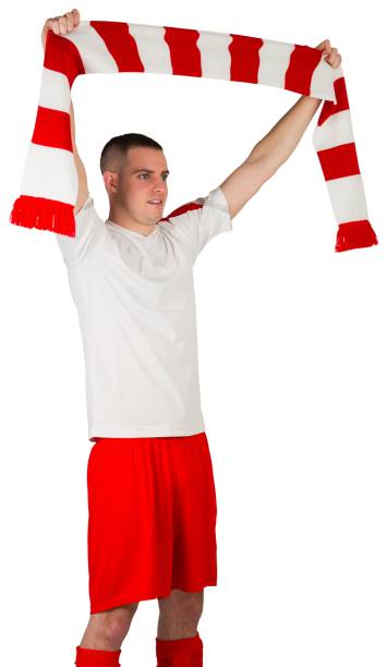 istock Football player holding striped scarf 834263330