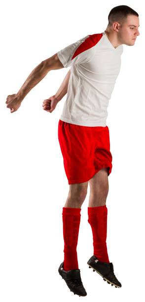 istock Fit football player jumping up 834263810