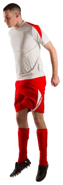 istock Fit football player jumping up 834263832