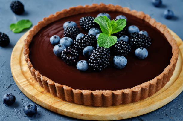 istock Chocolate tart with blackberries and blueberries 834264100