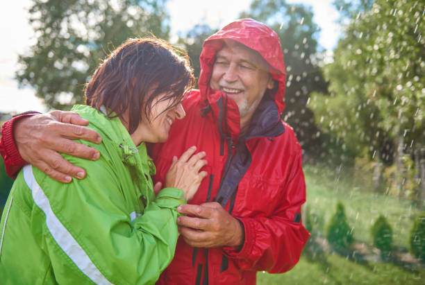 istock Couple having romantic time in the rain 834273272