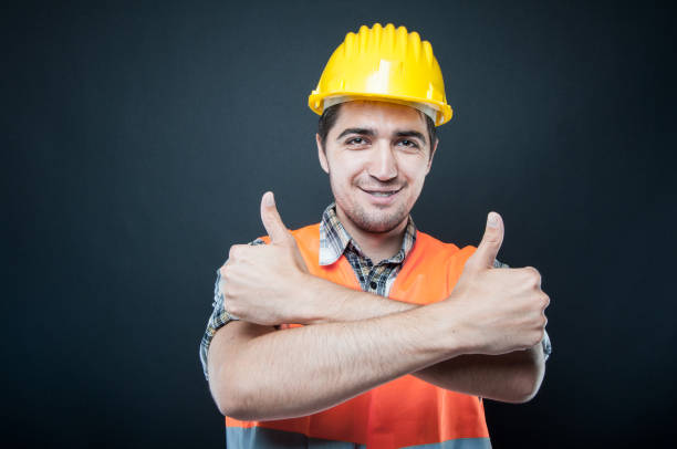 istock Constructor showing thumbs up with arms crossed 834276196