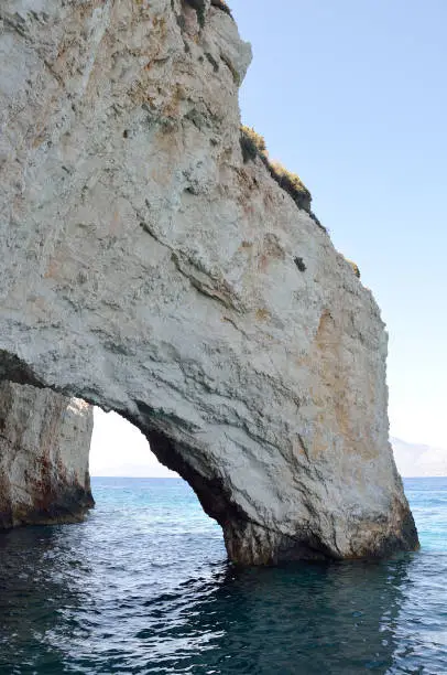 Photo of Natural rock arch at blue caves in island of Zakynthos