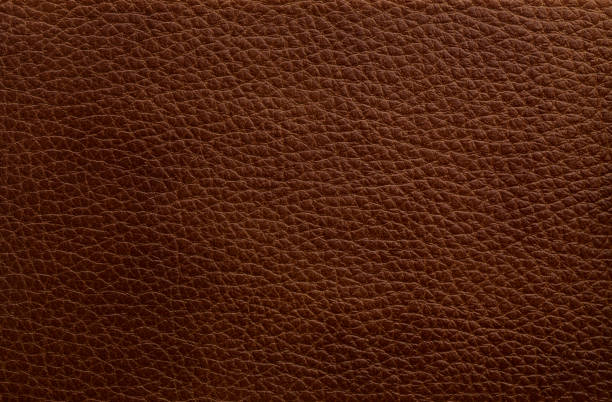 istock Natural genuine dark brown leather texture Natural pattern Brown Backgrounds 834302684