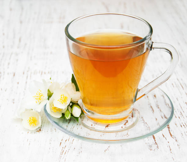 istock Cup of tea with jasmine flowers 834309100