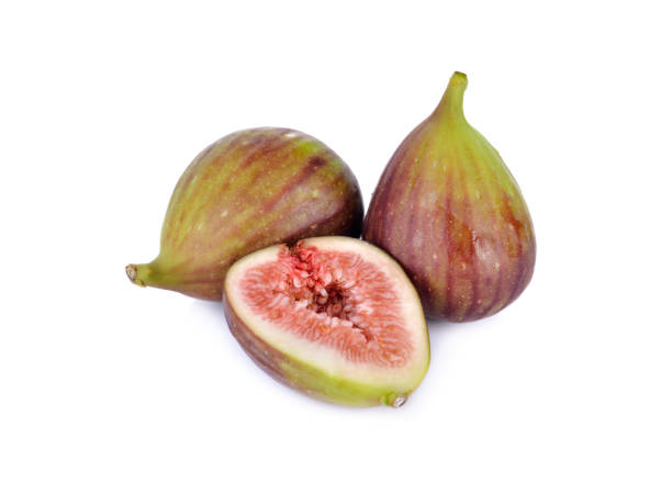 istock whole and half cut ripe fig on white background 834317348