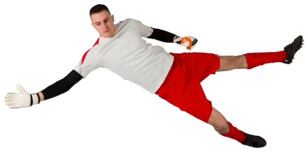 istock Fit goal keeper jumping up 834345126