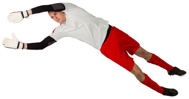 istock Fit goal keeper jumping up 834345200