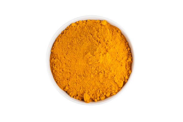 istock turmeric powder in white ceramic bowl 834350370