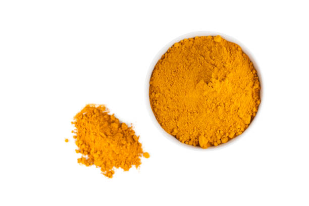 istock turmeric powder in white ceramic bowl 834350834