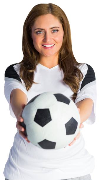 istock Pretty football fan smiling 834351092