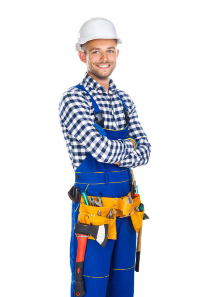 istock Happy smiling construction worker in uniform and tool belt with crossed arms 834367772