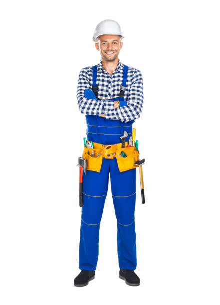 istock Full length portrait of happy construction worker in uniform and tool belt 834367778