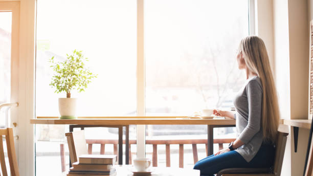 istock Young stylish woman in cafe 834374436