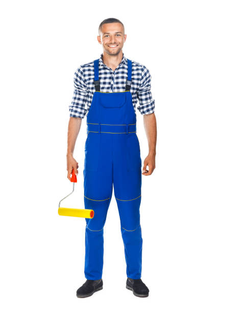 istock Full length portrait of smiling painter with paint roller 834376110