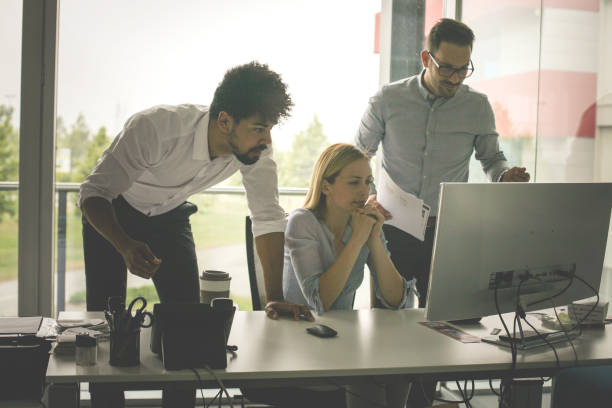 istock Business people using technology and having conversation. Business people at the office. 834383628