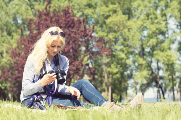 istock Professional woman photographer 834413152