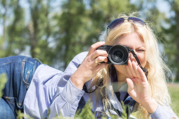 istock Professional woman photographer 834413162