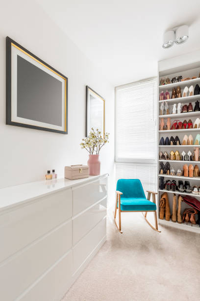 istock Elegant white walk-in closet 834429338