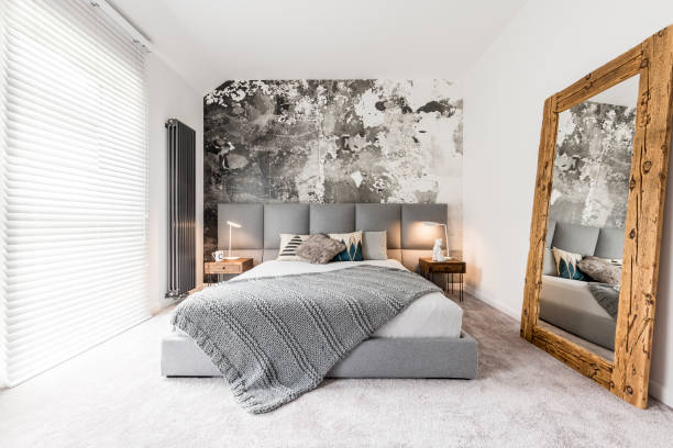 bedroom with large wooden mirror - headboard imagens e fotografias de stock