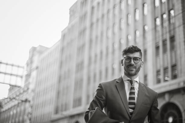 istock Businessman walking on the street 834429504