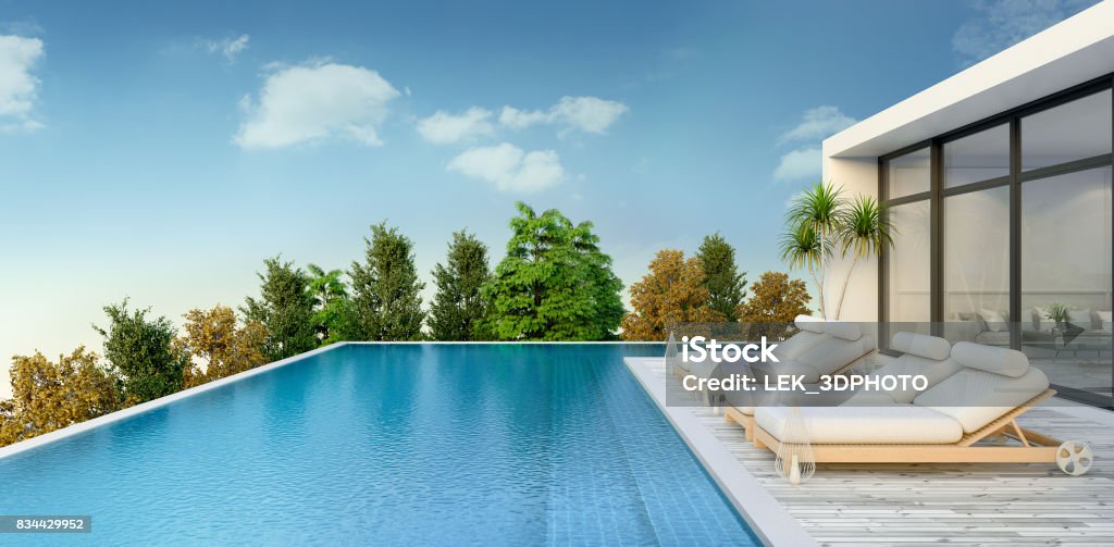 Summer ,beach lounge, sun loungers on Sunbathing deck and private swimming pooland  panoramic sea view at luxury villa/3d rendering Vacation Rental Stock Photo