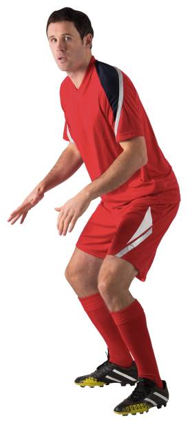 istock Football player in red standing ready 834437050