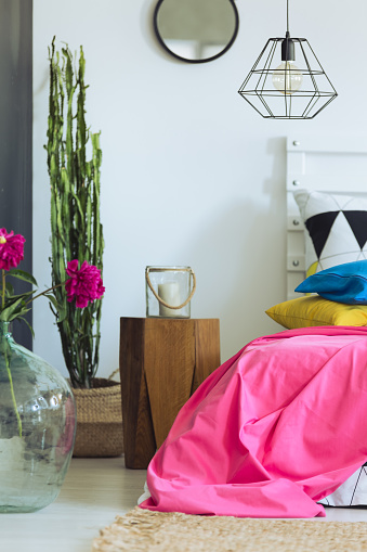 Fresh modern bedroom with colorful accessories and juicy colors