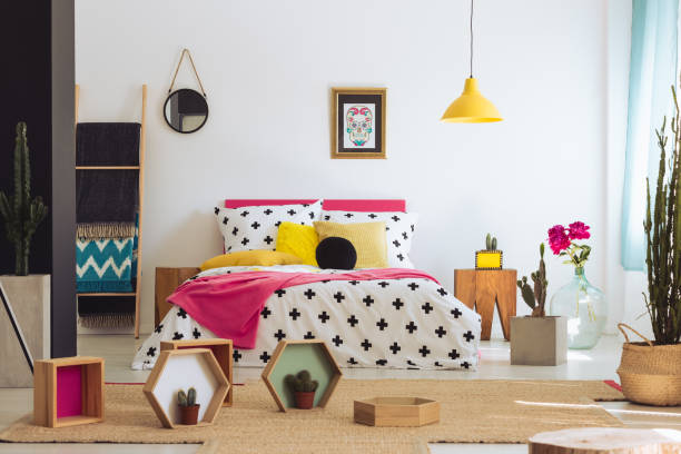 Geometric bedroom with colorful bed