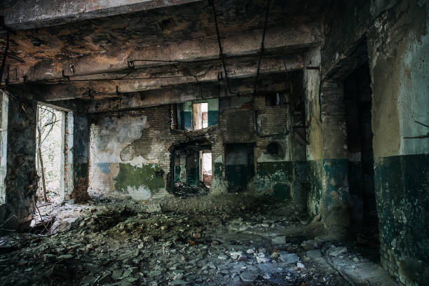 istock Corridor in abandoned factory building 834457748