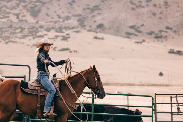 istock riding cowgirl 834494204