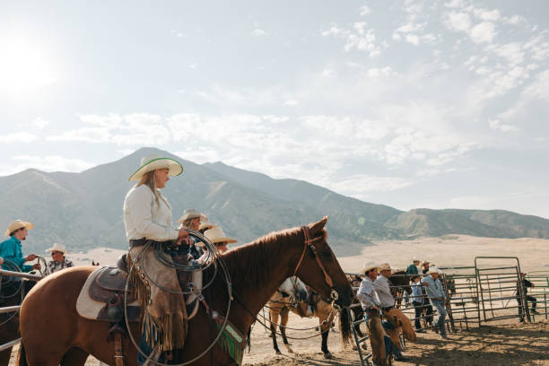 istock cowgirl riding on the ranch 834498824