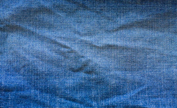 istock Texture of blue jeans 834510722