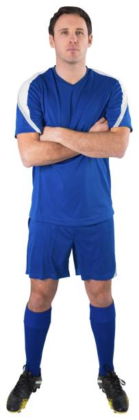 istock Handsome football player looking at camera 834524096