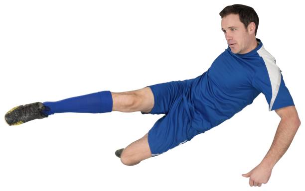 istock Football player in blue kicking 834525012