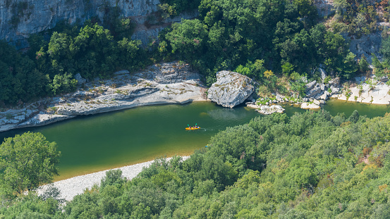 Ardeche, gorges, beautiful touristic landscape with kayaks on the river