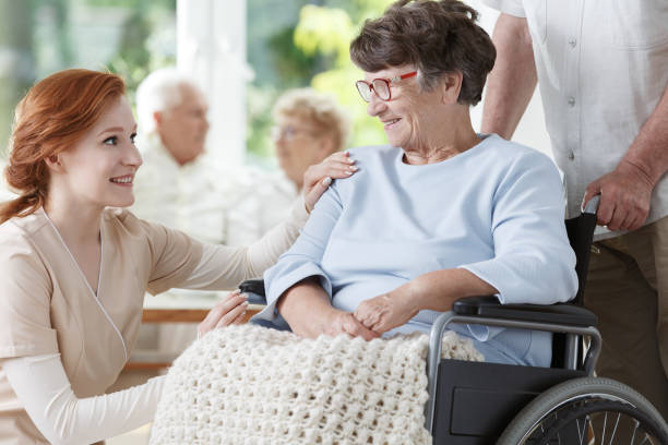 istock Smiling elder woman on wheelchair 834528776