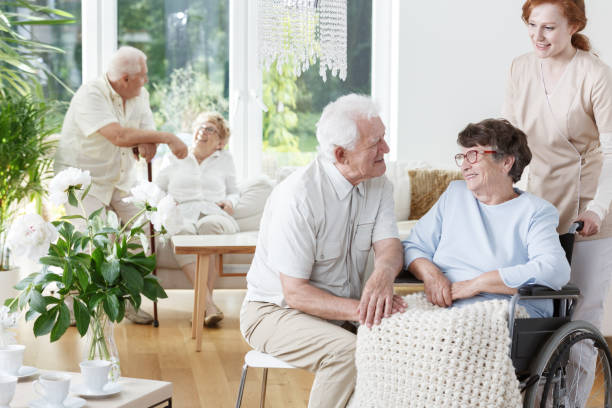 istock Senior man visits his smiling wife 834528794