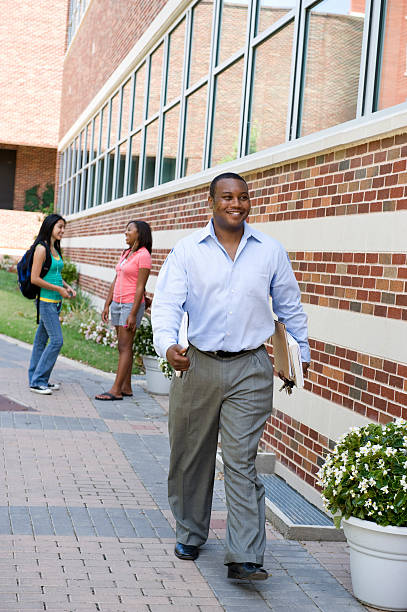 Professor Walk 510+ Professor Walking On Campus Stock Photos, Pictures & Royalty-Free ...