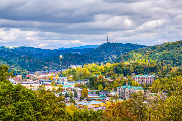 Gatlinburg, Tennessee, USA Gatlinburg, Tennessee, USA town skyline in the Smoky Mountains. gatlinburg great smoky mountains national park north america tennessee stock pictures, royalty-free photos & images