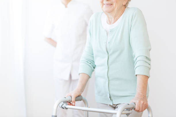 istock Disabled elderly woman in blue sweater 834573978