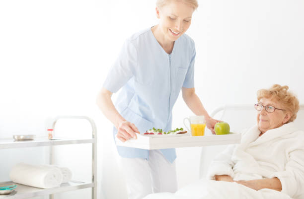 istock Assistant brought tasty and healthy food 834574122