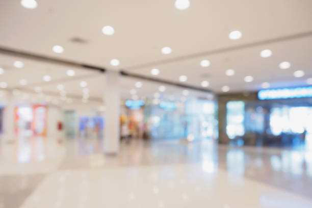 istock Abstract blur defocused shopping mall interior background 834574284
