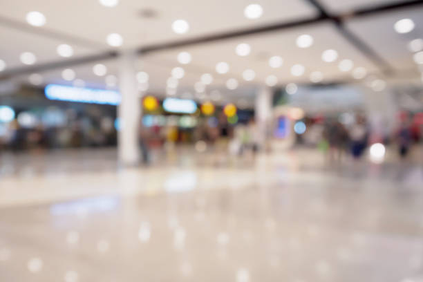 istock Abstract blur defocused shopping mall interior background 834574358