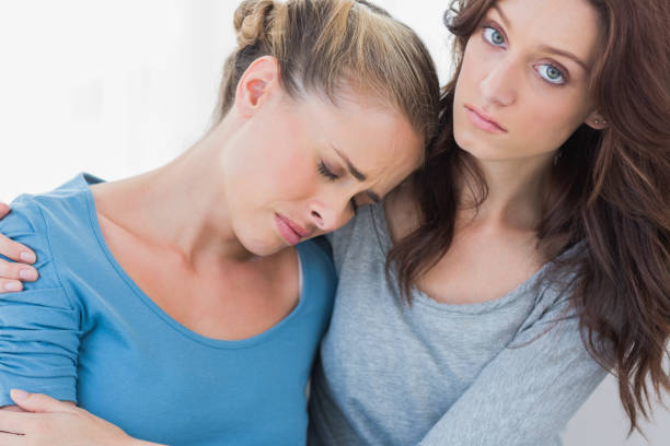 istock Woman consoling her upset friend 834586900