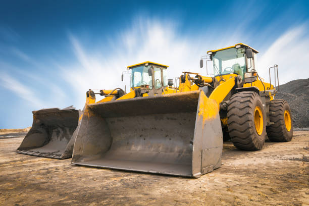 bulldozer sur un chantier - ripper photos et images de collection