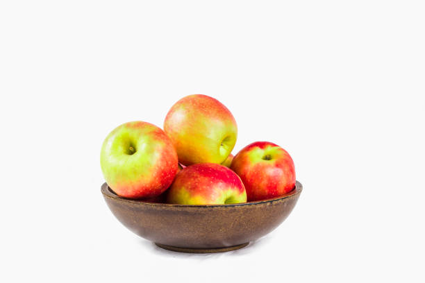 istock Pink lady aples in a wooden bowl 834609818