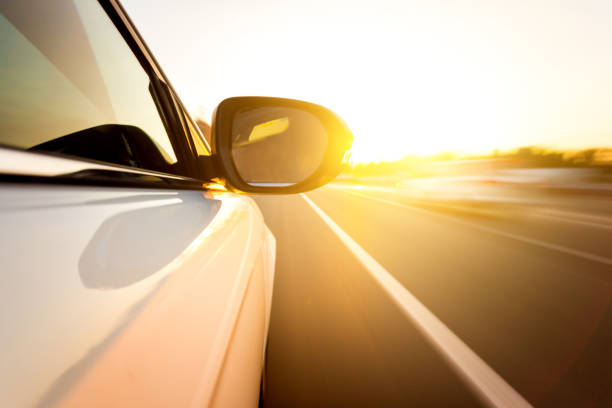 istock View from side of car driving 834610564