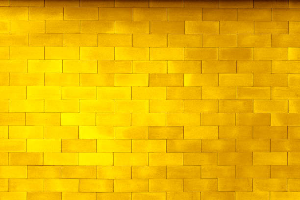 Gold yellow color texture pattern abstract background can be use as wall paper screen saver brochure cover page or for presentations background or articles background also have copy space for text.