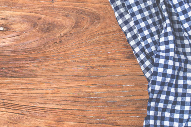istock Tartan, wooden background 834645986